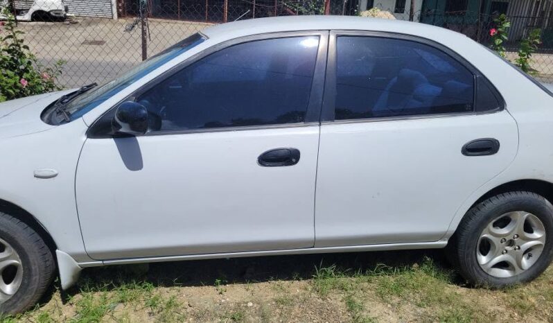 Mazda 323 – $9,500 full